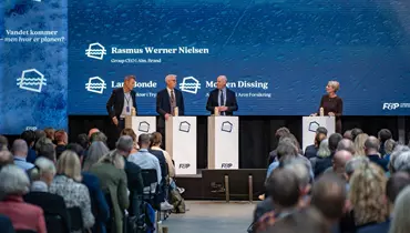 Paneldebat om klimaforandringer og forsikring med deltagelse fra Aros Forsikring og andre brancheaktører