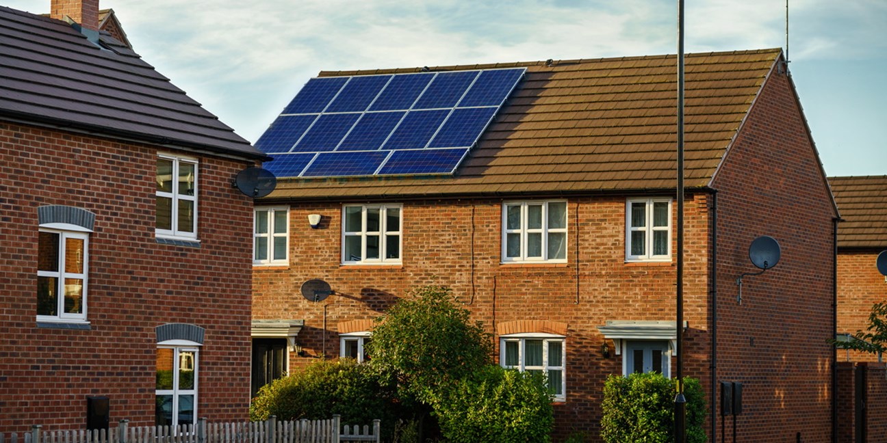 Solar panels on the roof of a semi-detached house