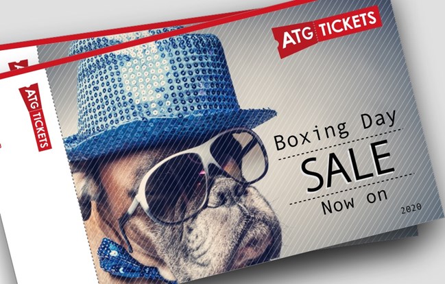 A dog wearing a top hat and sunglasses is on an ATG ticket