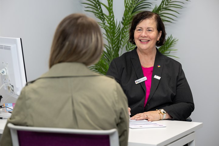 Team member in branch helping a customer