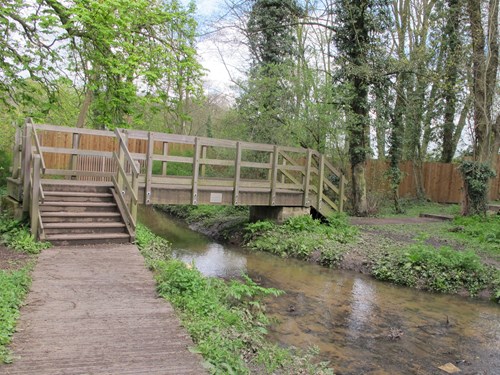 A wooden bridge over water at Skegby Hall