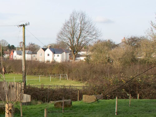 Houses surrounded by countryside at Stanton Hill village