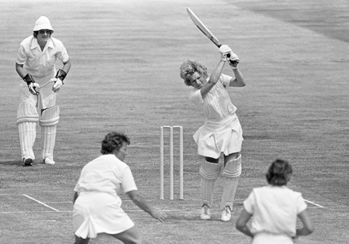 Enid Bakewell batting at a cricket match
