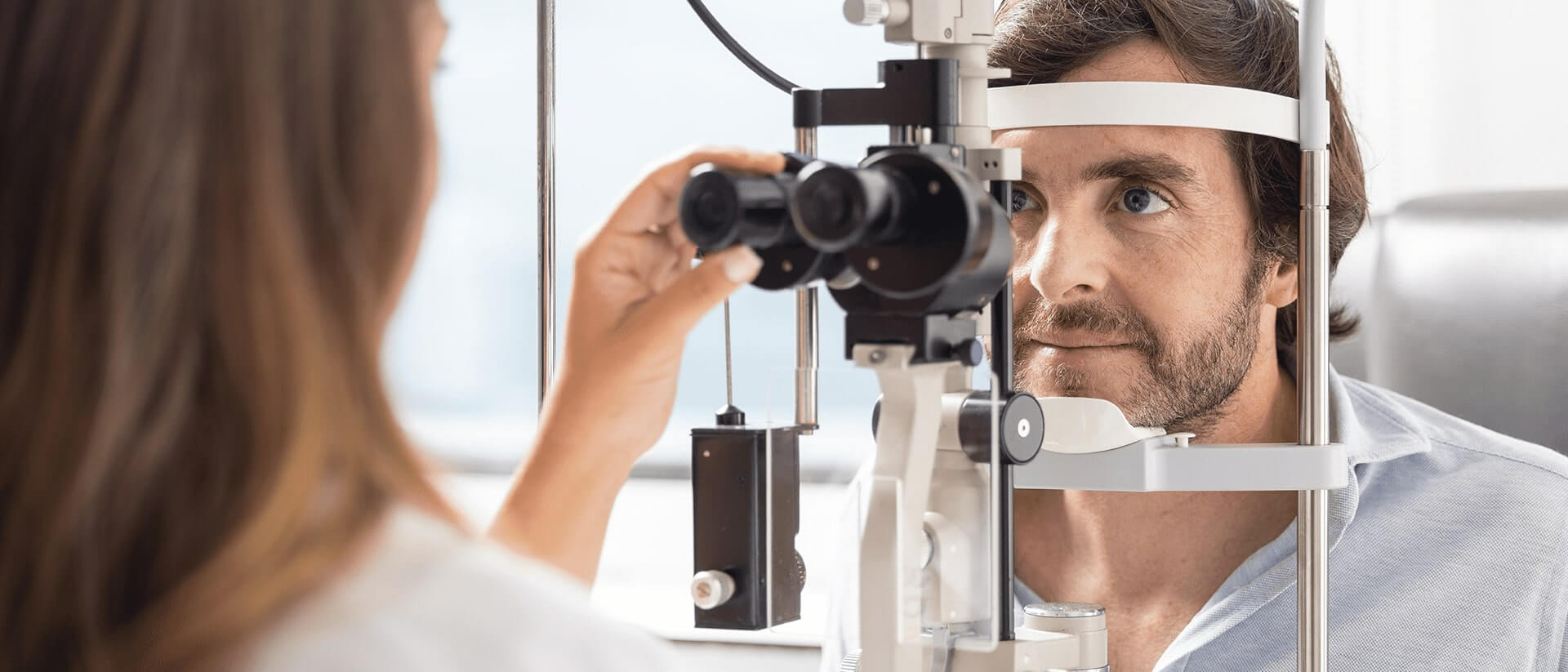 doctor to carry out an ophthalmology examination on a patient