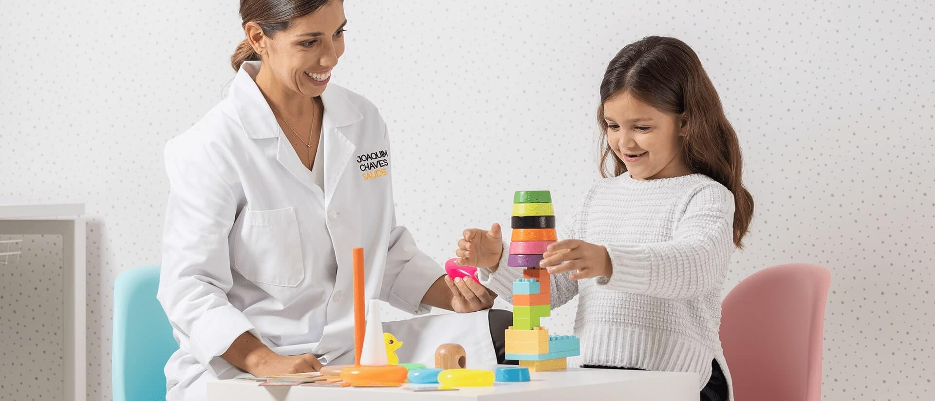 doctor and patient play with some assembly objects