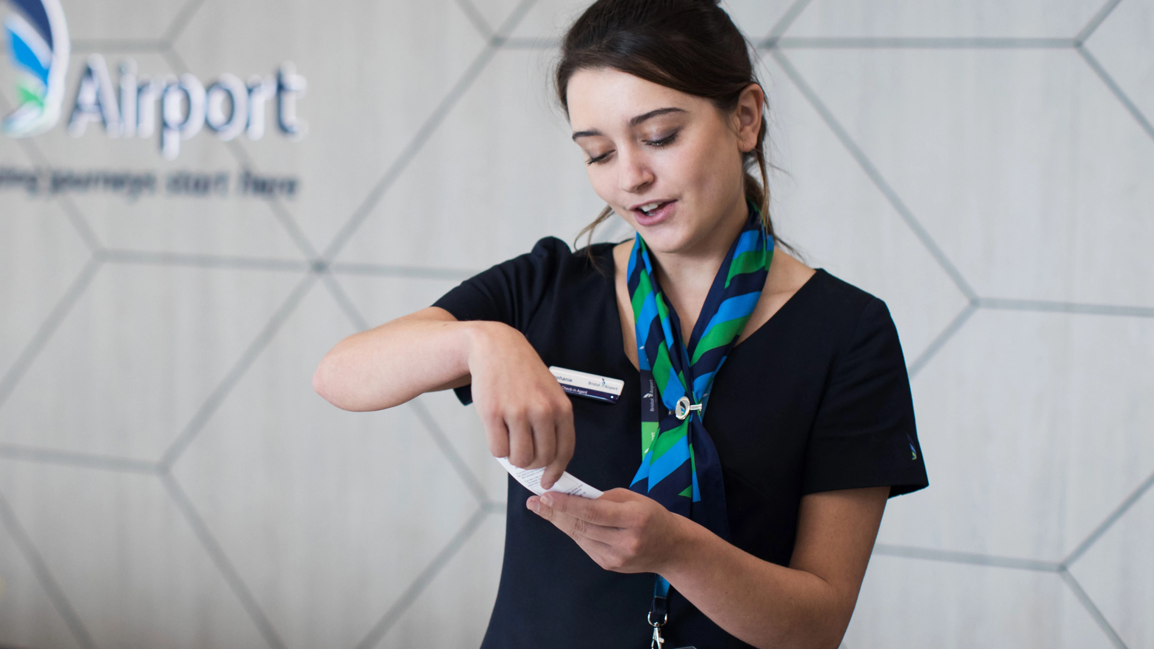 Bristol Airport staff checking ticket