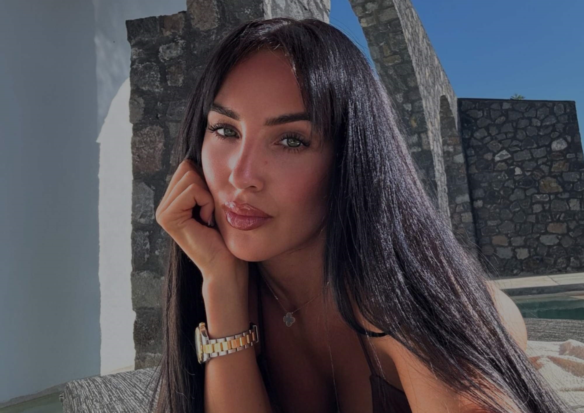 Girl resting her chin on her hand