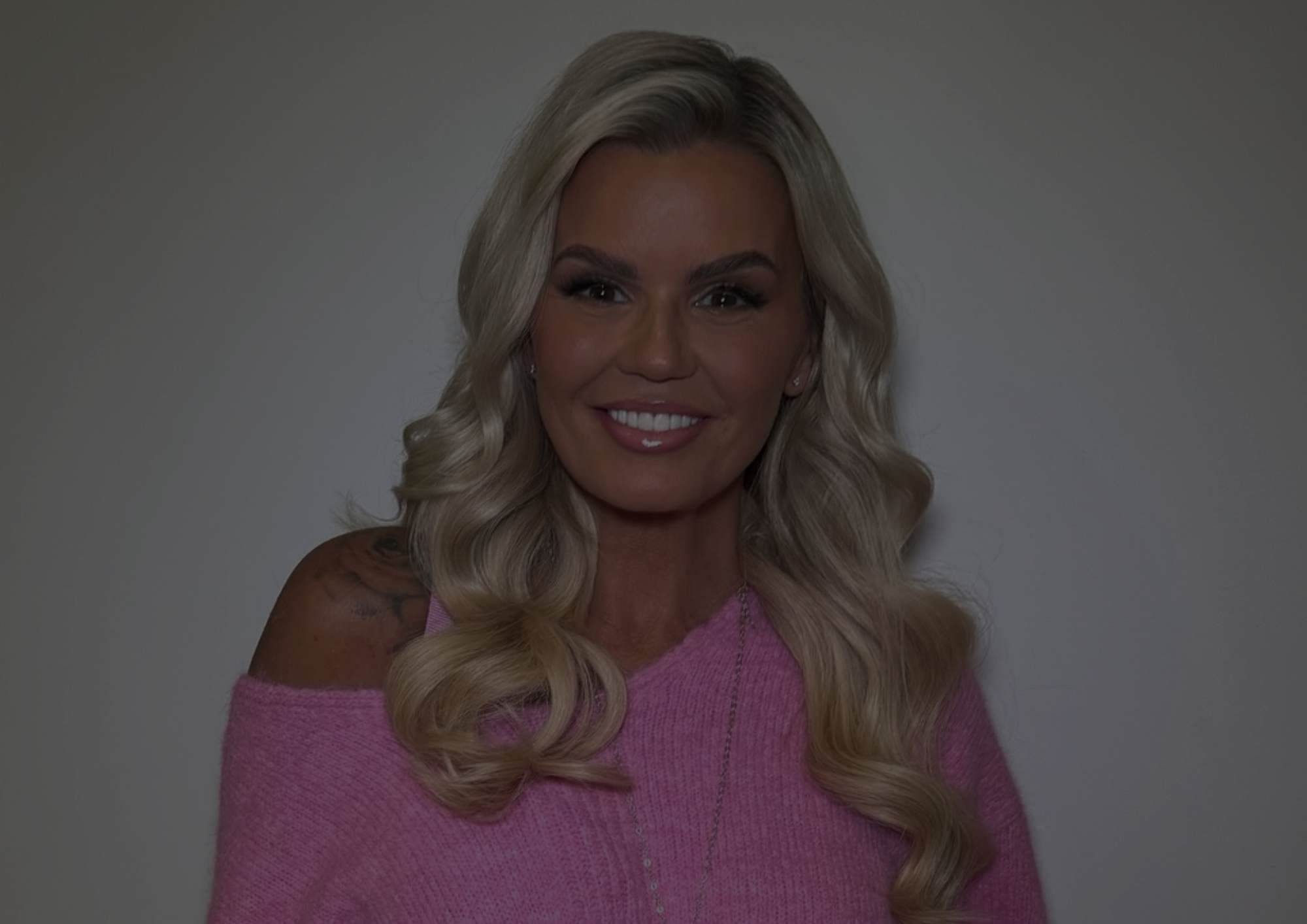 Kerry Katona in a pink jumper
