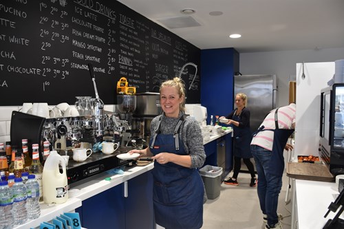 A server making a drink at Moor Café