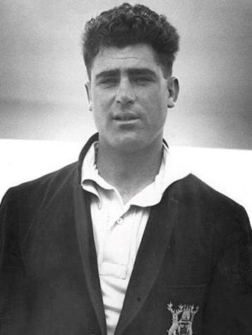 Black and white photo of Nottinghamshire cricketer Bill Voce in a cricket blazer in 1932