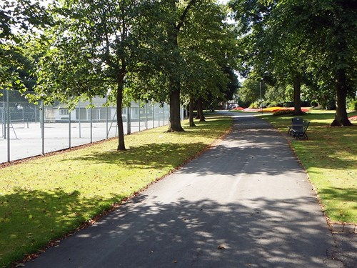 Tree-lined pathway next to Sutton in Ashfield Tennis Club courts