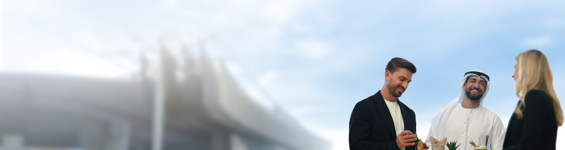 Three business professionals exchanging ideas outdoor.