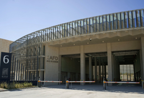 A building with a curved roof

AI-generated content may be incorrect.