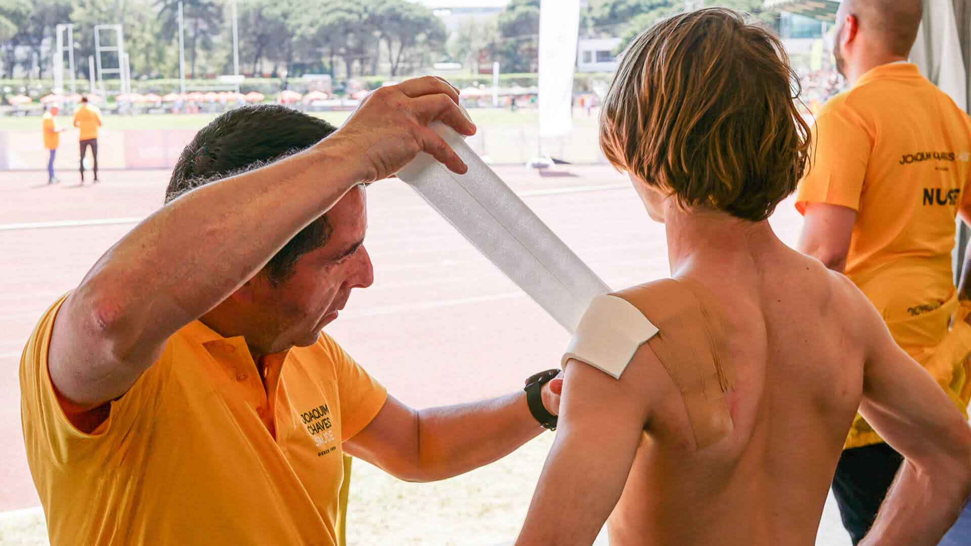 Doctor treating athlete's injury