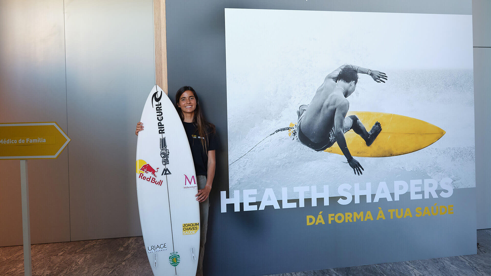 Teresa Bonvalot with her surfboard