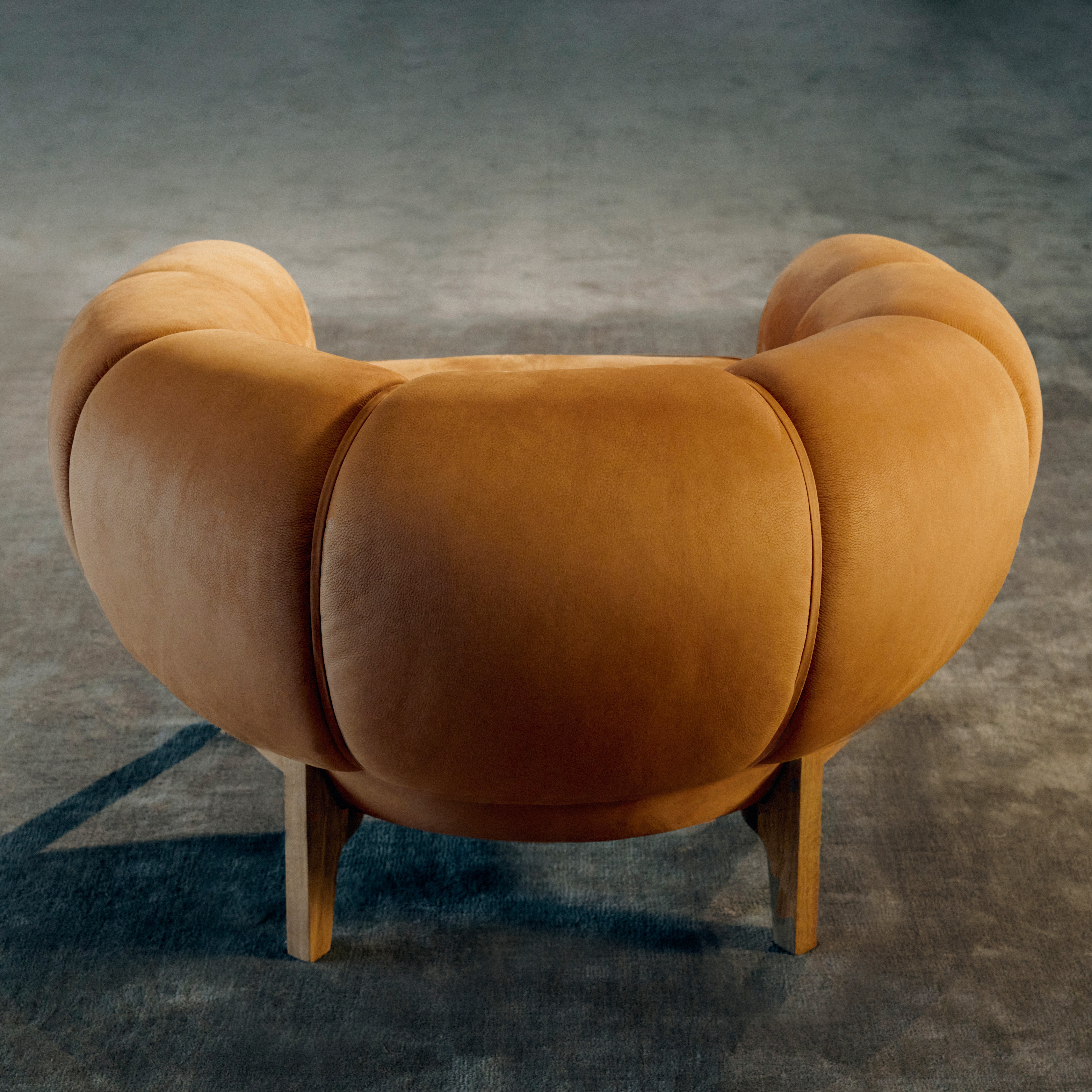 The Croissant Sofa and Lounge Chair, represent an elegant and playful