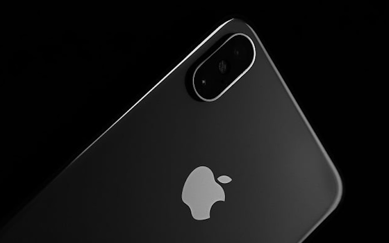 Close-up of a black iPhone XS and its camera notch.