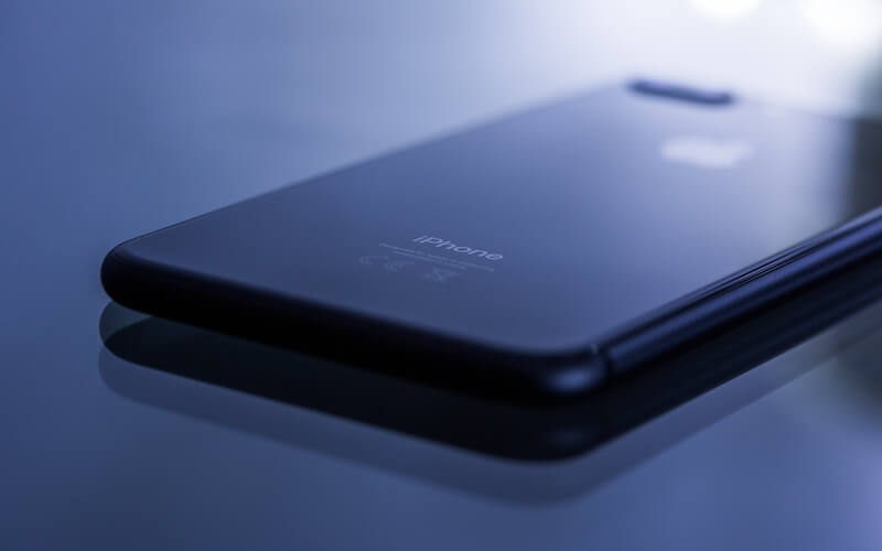 A close up of a black iphone