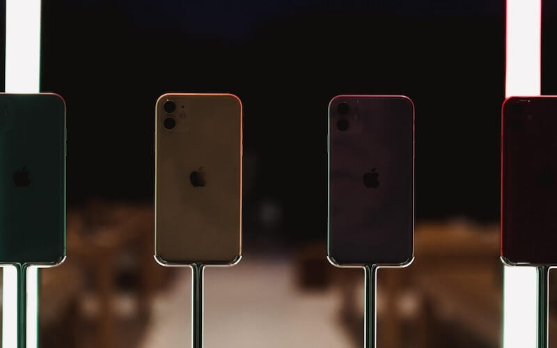 Photo of a range of iPhone models all placed on stands