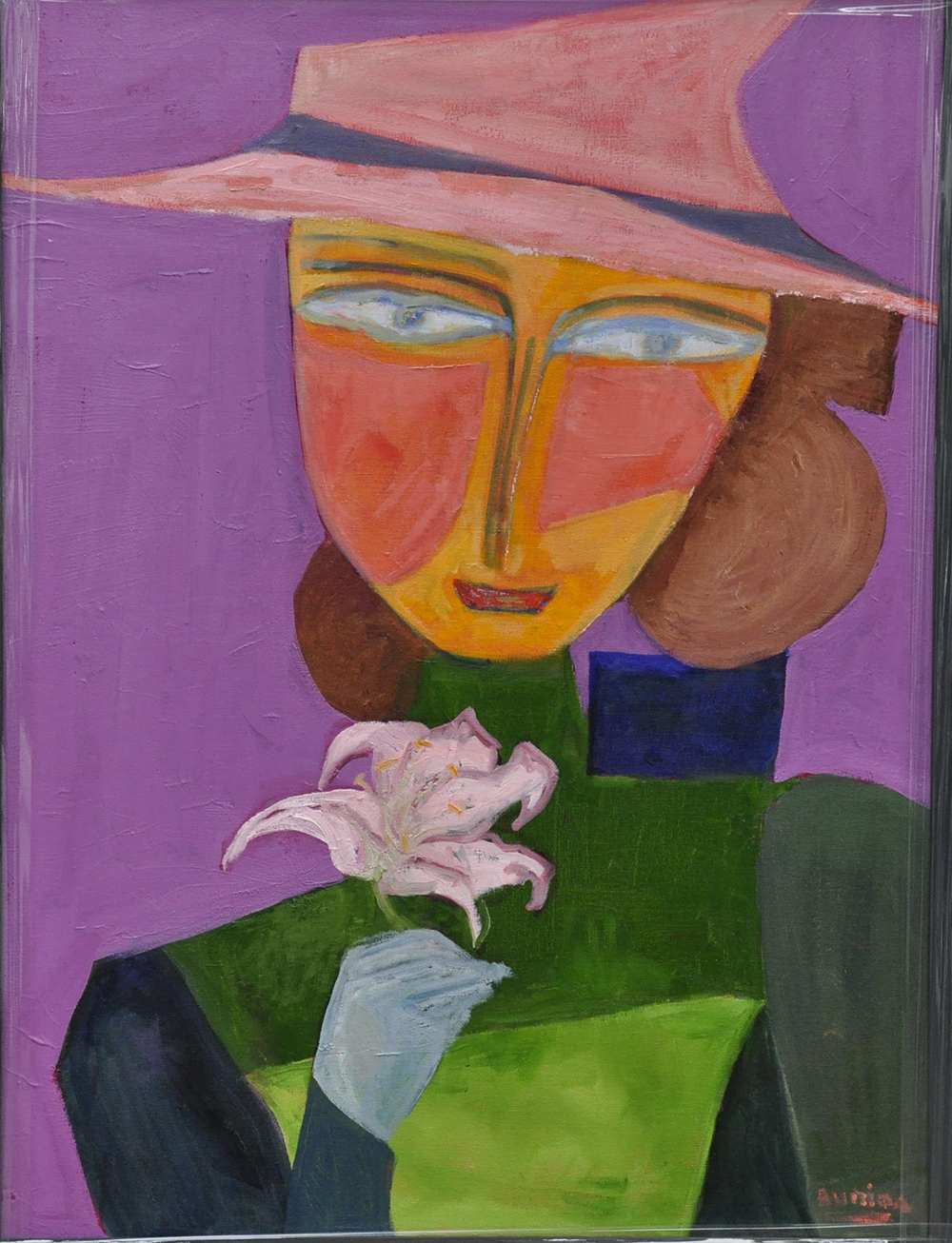 A girl with a pink hat and a flower in hand