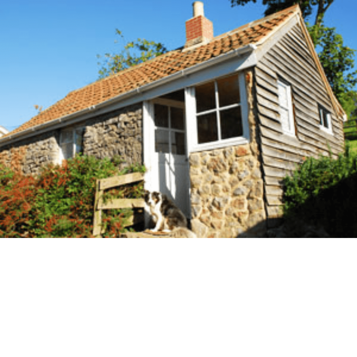 Bradley Cross Farm exterior shot of cosy cottage