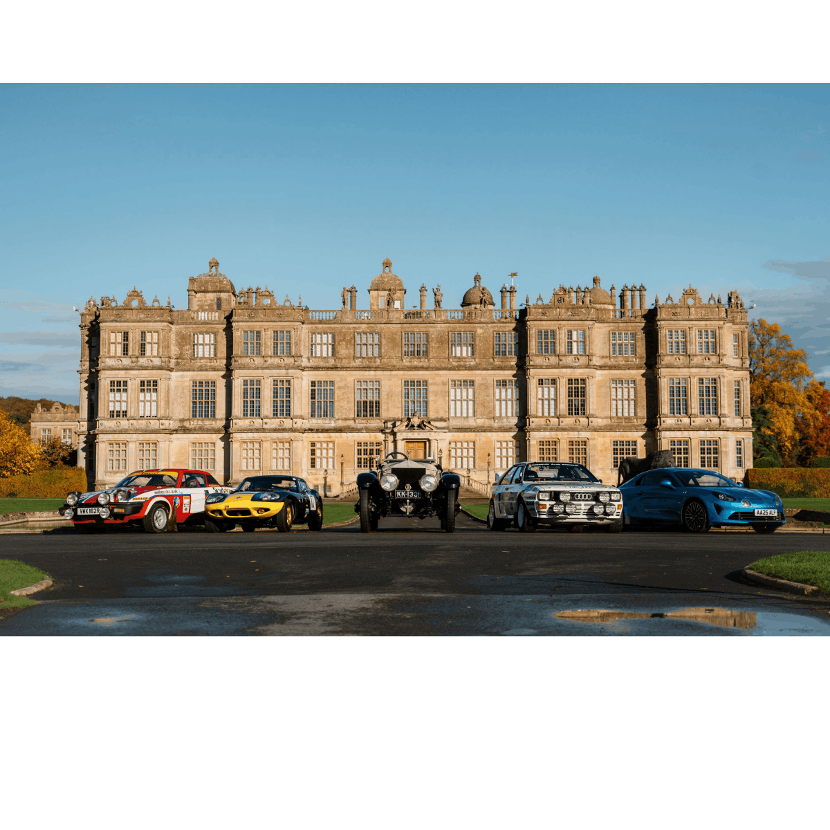 A selection of cars in front of Longleat House