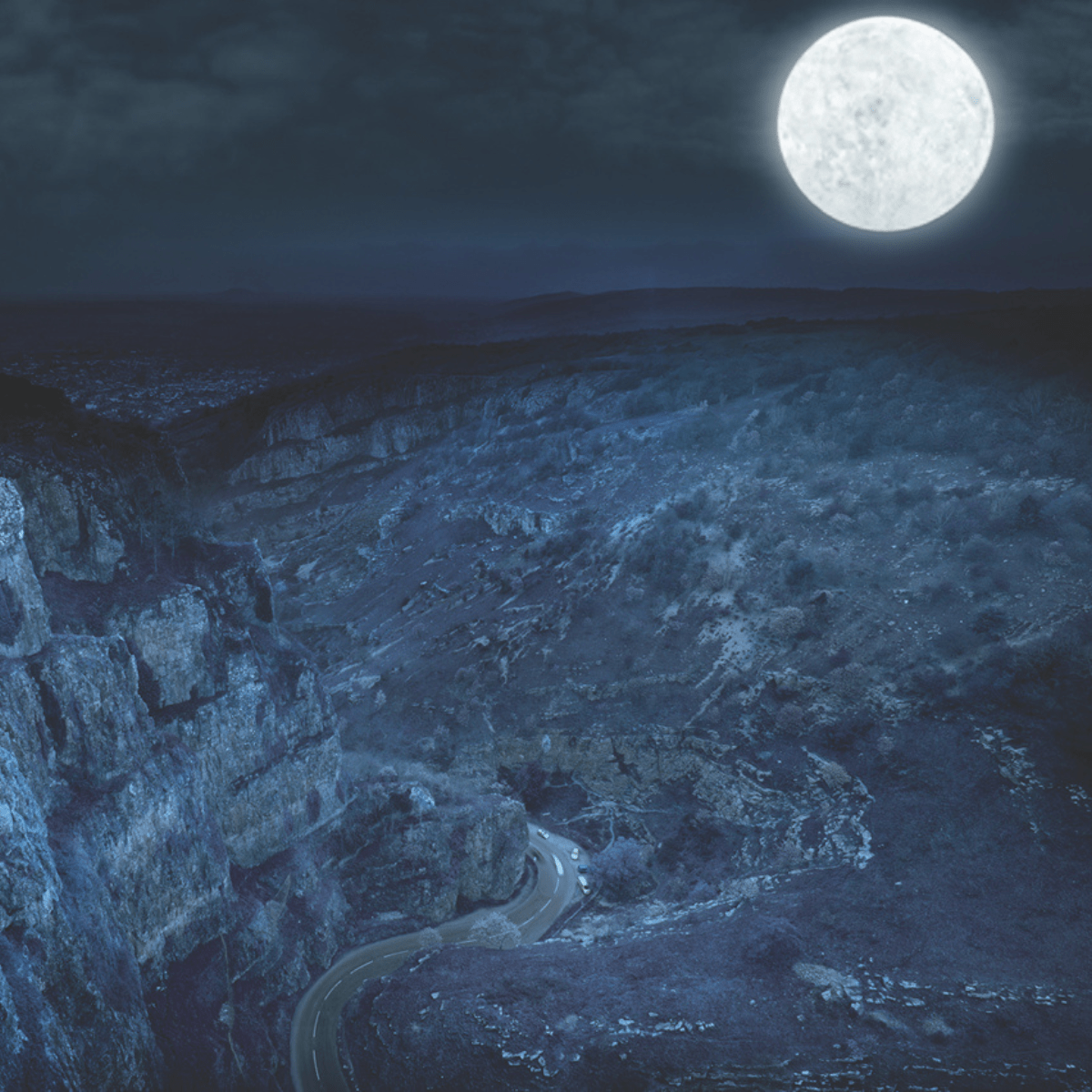 Halloween at Cheddar with a full moon lighting up the gorge