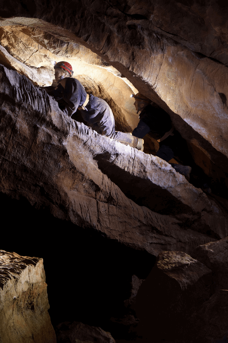 An adventure caver enjoying the activity at Cheddar