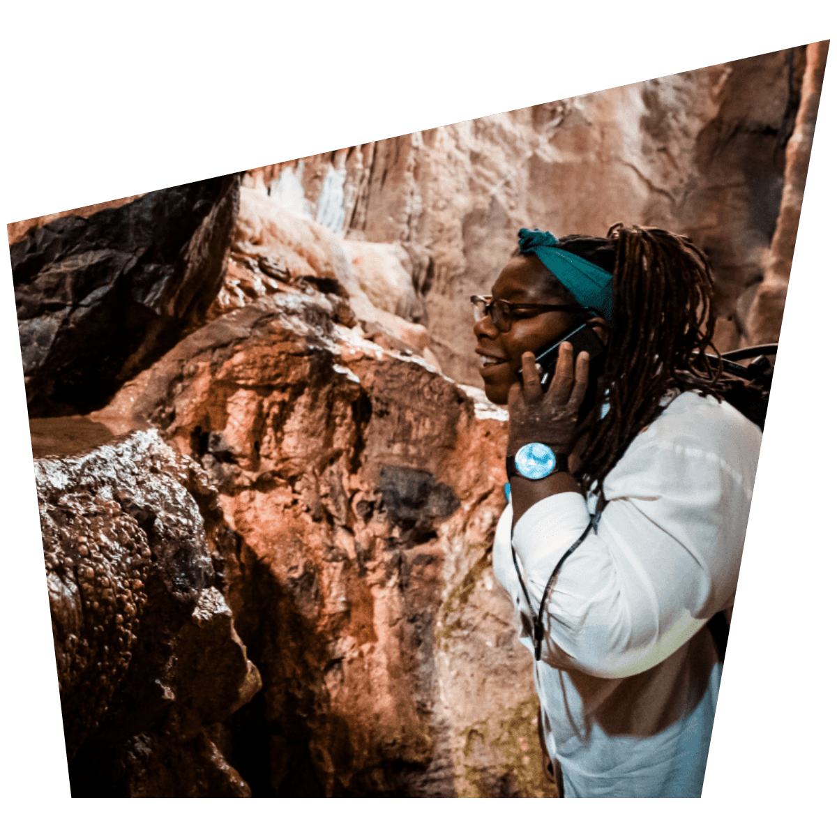A visitor uses the audio guides inside Gough's Cave to find out more information about the attraction