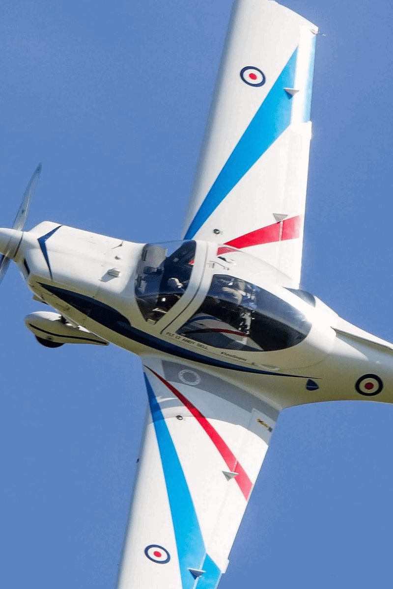An RAF Tutor plane flying in the sky