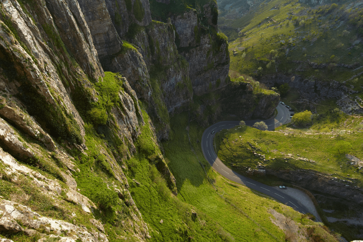An ariel shot of Cheddar Gorge with its winding roads below