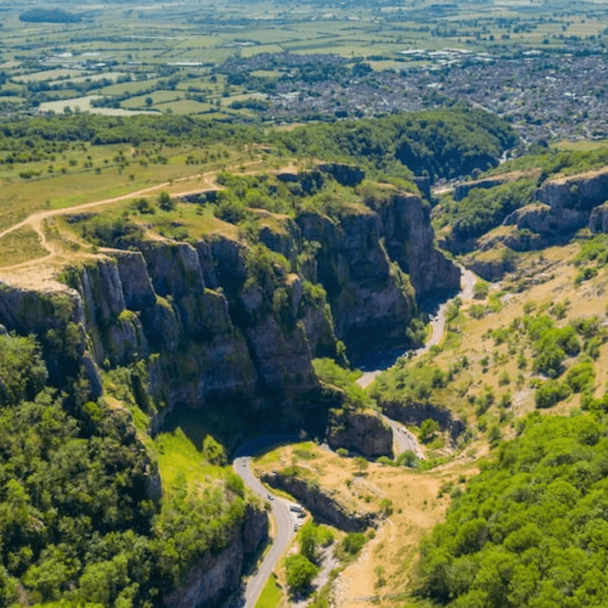 An ariel shot of Cheddar Gorge with its sweeping cliffs and winding road