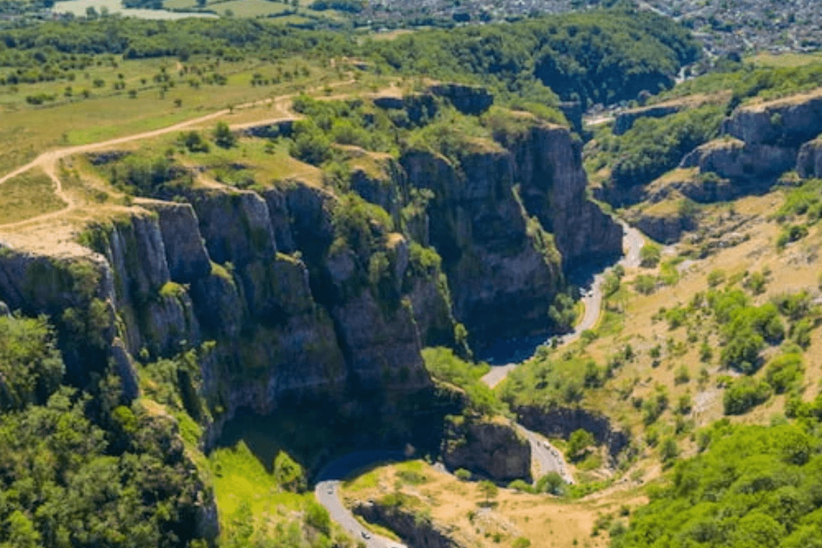 An ariel shot of Cheddar Gorge with its sweeping cliffs and winding road