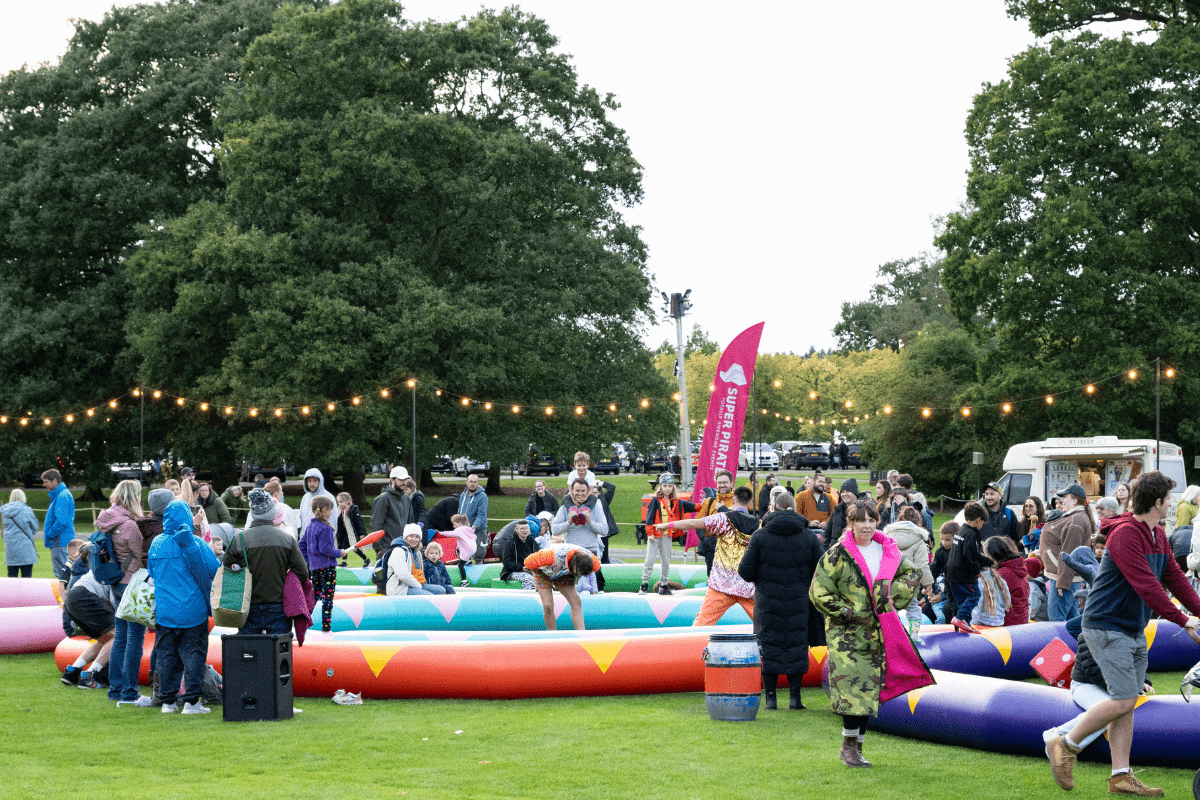 children playing on inflatables