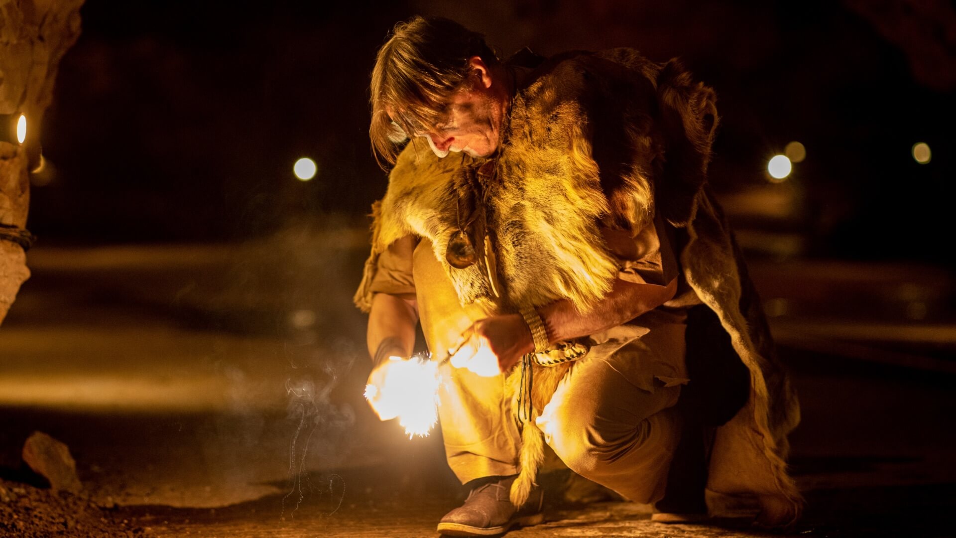 Cheddar Gorge And Caves Whats On Events person dressed as prehistoric cave dweller