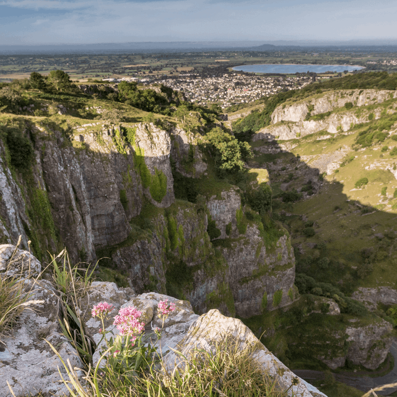 A landscape shot of the vast gorge and rolling hills at Cheddar