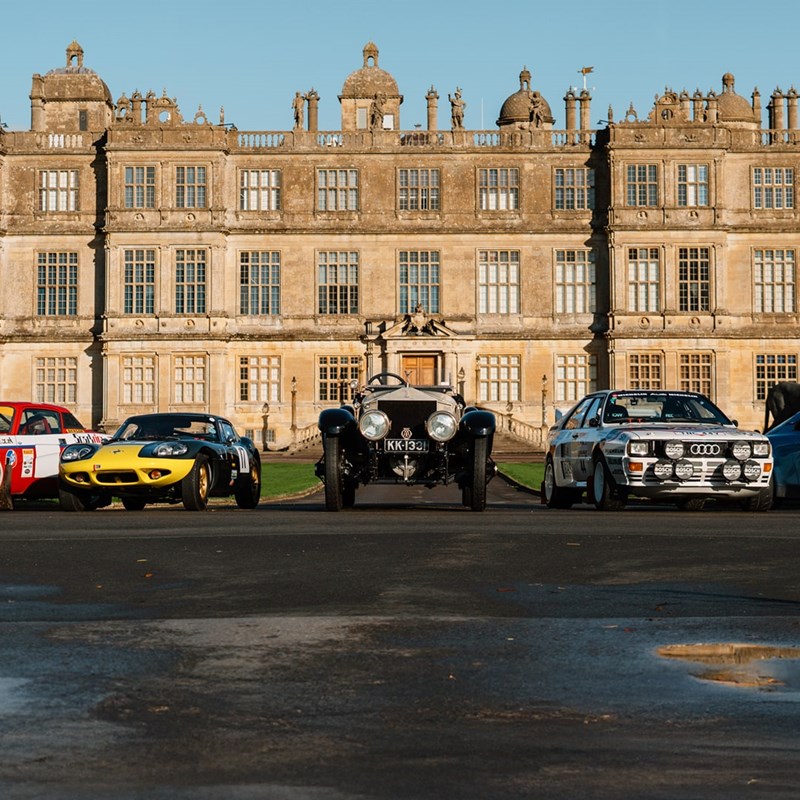 A range of rally, classic and vintage cars parked in front of Longleat House to promote the Motor Show Weekender
