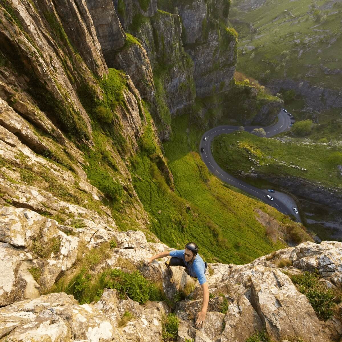 A BMC Member impressively climbs up one of the rock formations at Cheddar gorge nearing the top