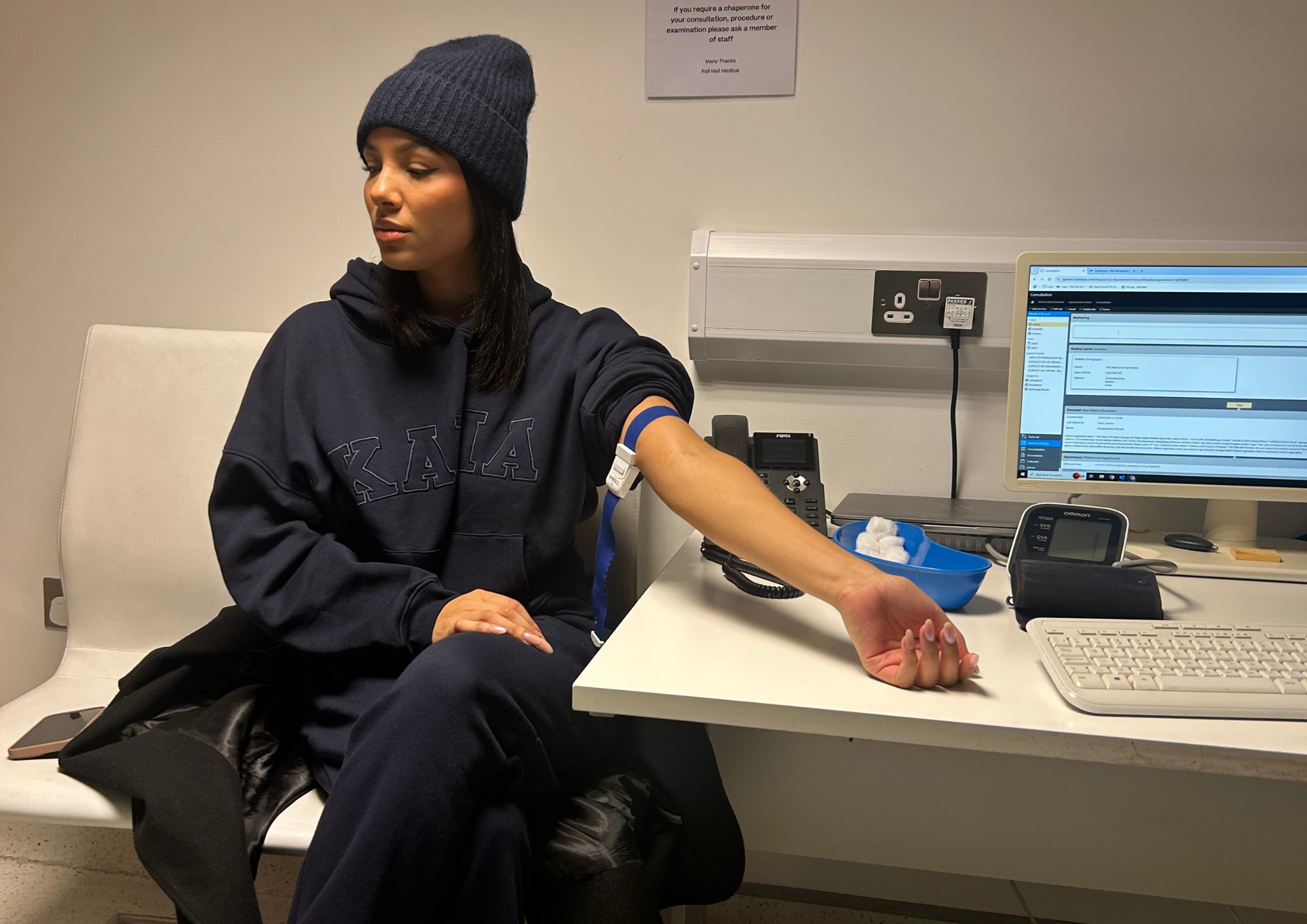 Woman getting a private blood test at Pall Mall