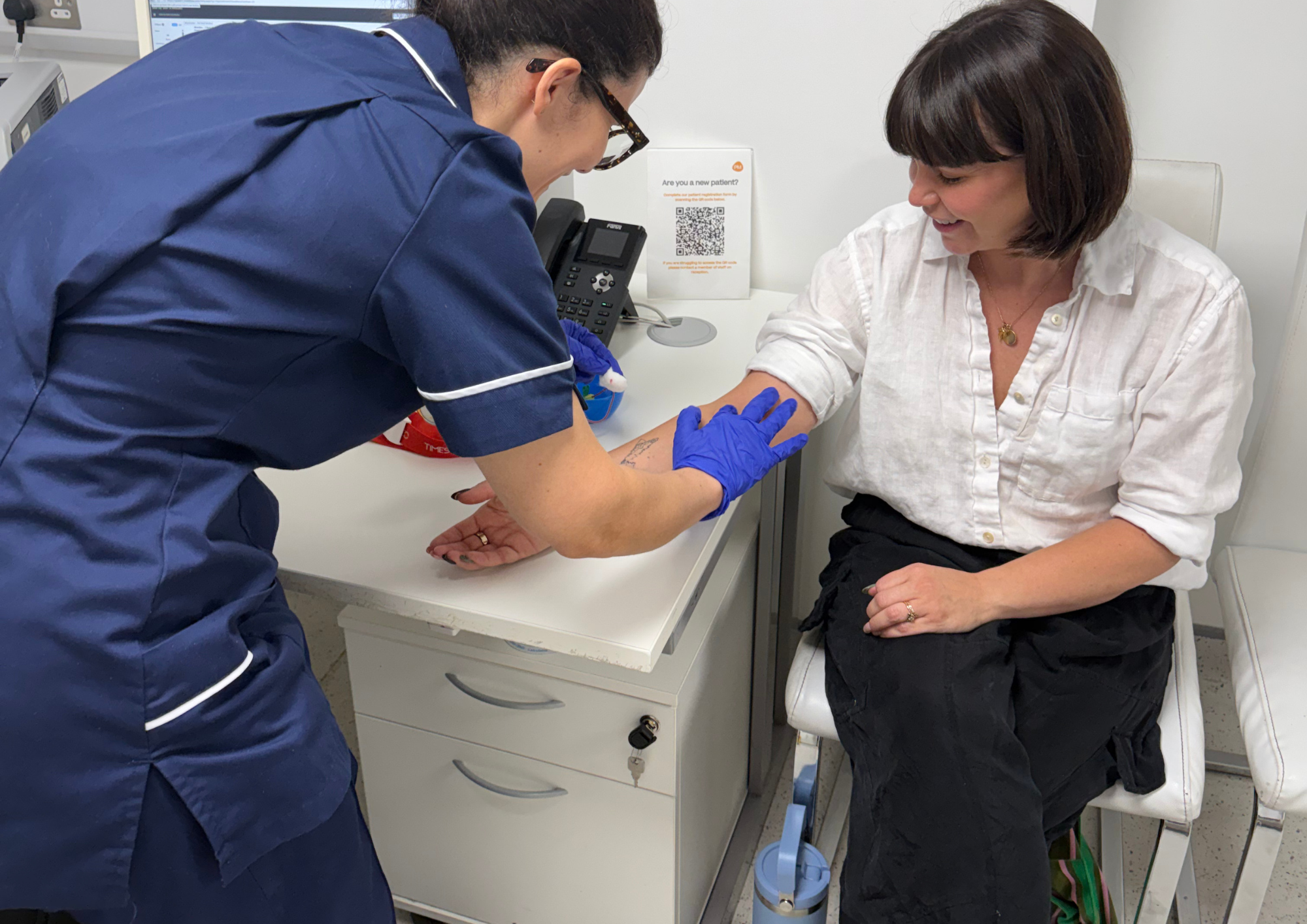 Woman getting a private thyroid blood test at Pall Mall