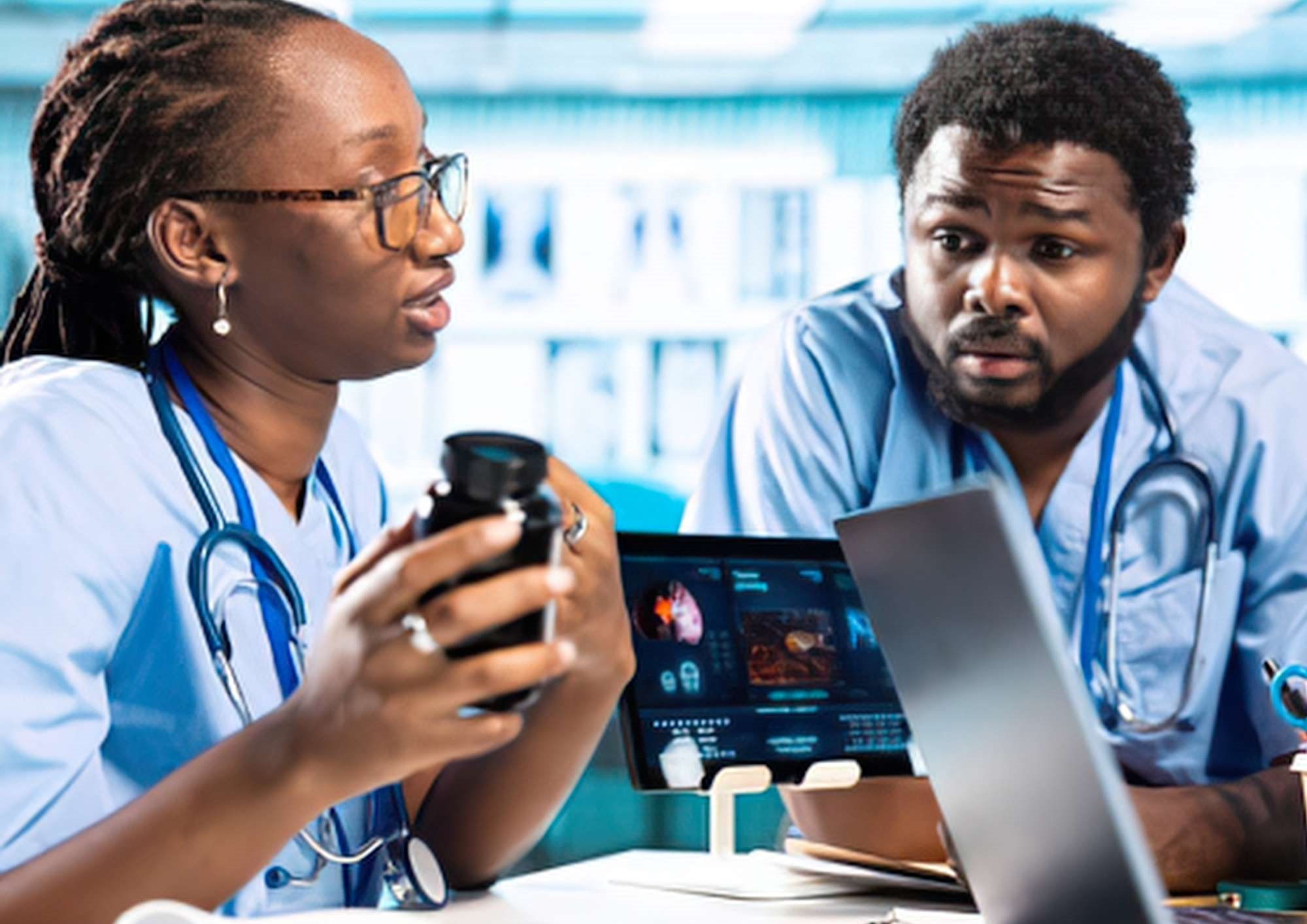 Two people discussing a musculoskeletal ultrasound Two people discussing a musculoskeletal ultrasound