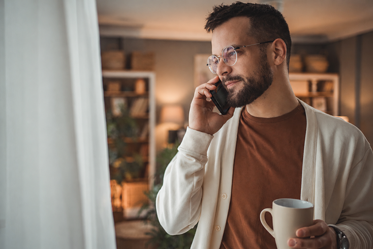 Person On The Phone At Home