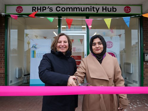 RHP Group CEO Sarah Thomas standing outside Butts Farm Community Hub with Richmond Councillor Aysha Tariq