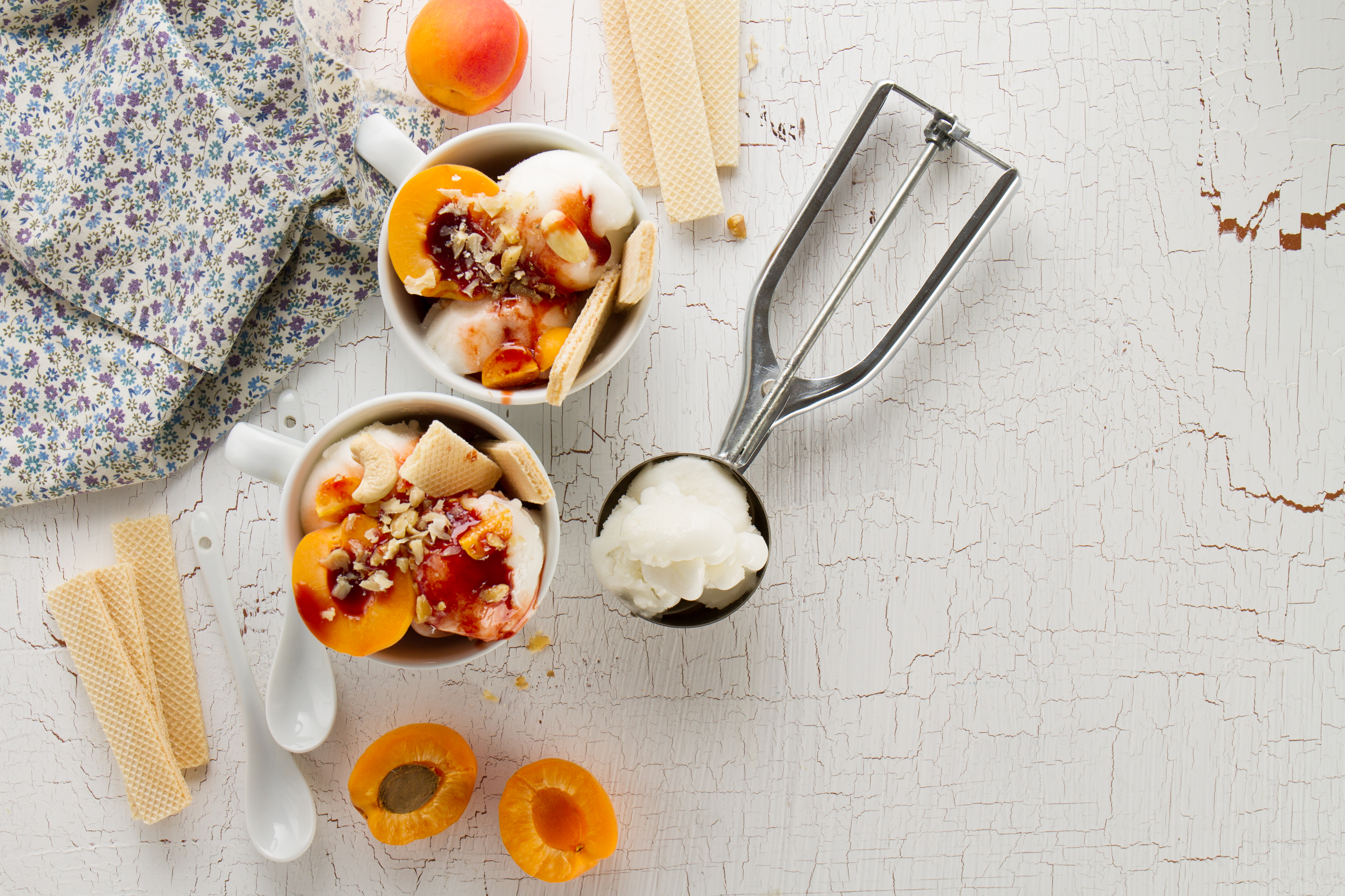 Tasty Fresh Cold Appetizing Vanilla Ice Cream With Nuts Apricots Waffles Syrup White Table With Ingredients Making Dessert Top View