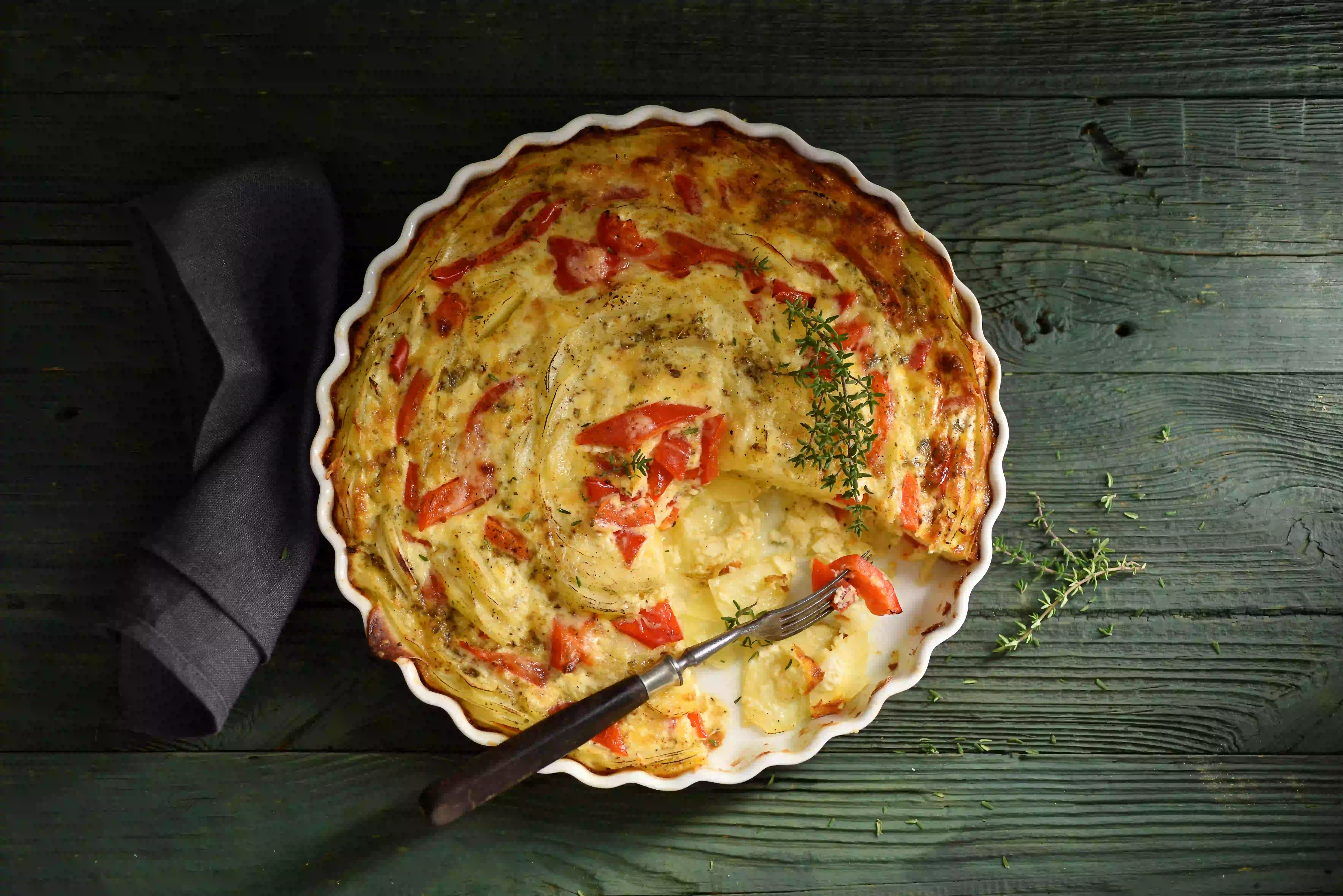 Kartoffel-Paprika Gratin – Ein köstlicher Bio-Genuss Kartoffel-Paprika Gratin – Ein köstlicher Bio-Genuss