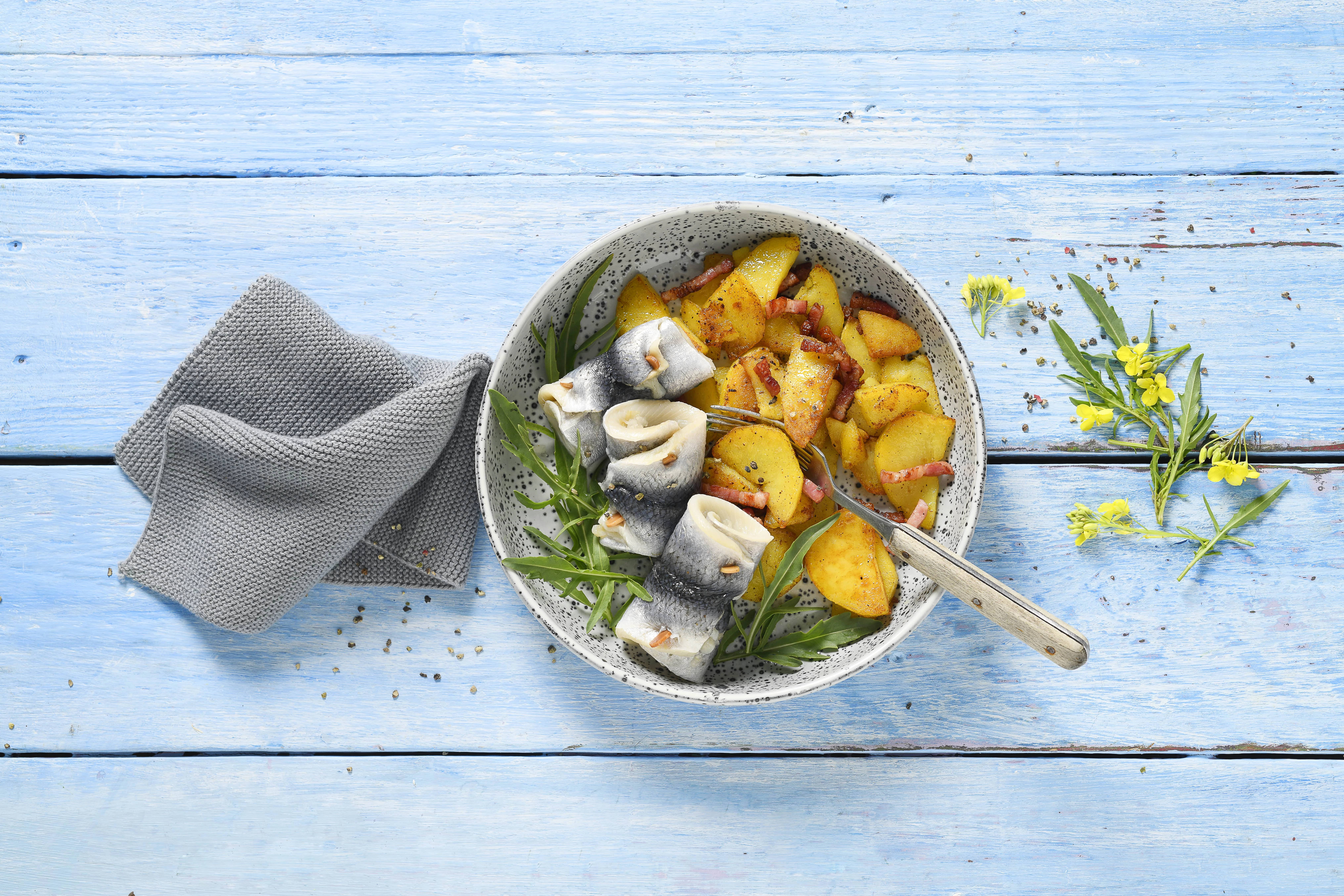Rollmops mit Bratkartoffeln und Schinkenwürfeln – Ein herzhaftes Gericht