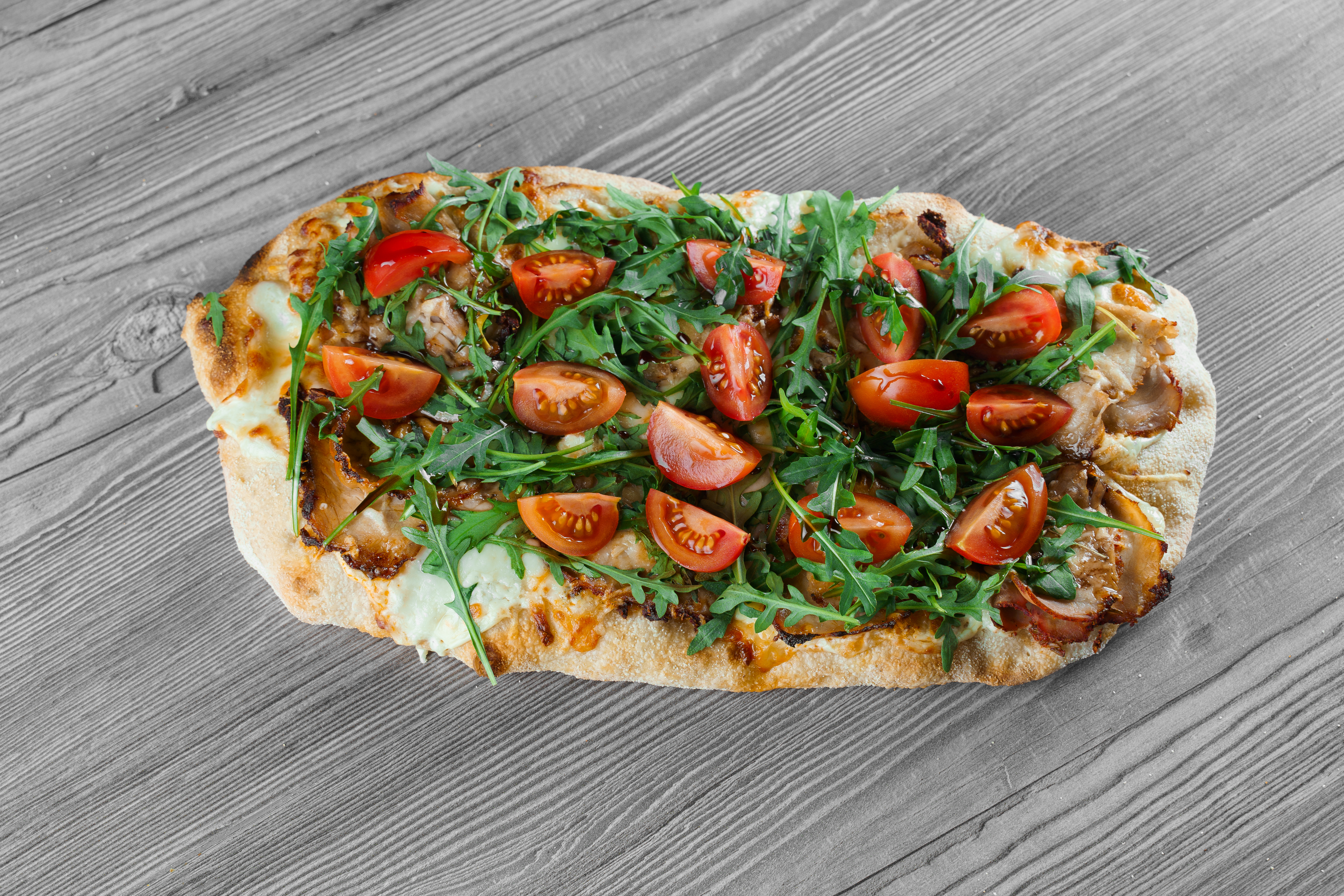 Scrocchiarella Gourmet Italian Cuisine Pinsa Romana Pinsa With Meat Arugula Tomatoes Cheese