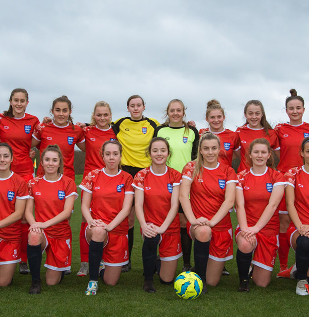 Team photo of the AoC ECFA team in red Serious Sport Kit 