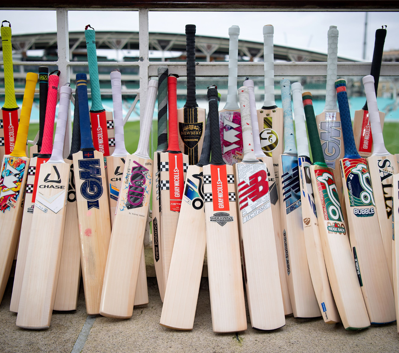 30 cricket bats displayed on the balcony of the Oval Cricket Ground 