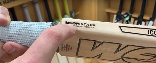 GM now sticker on edge of bat